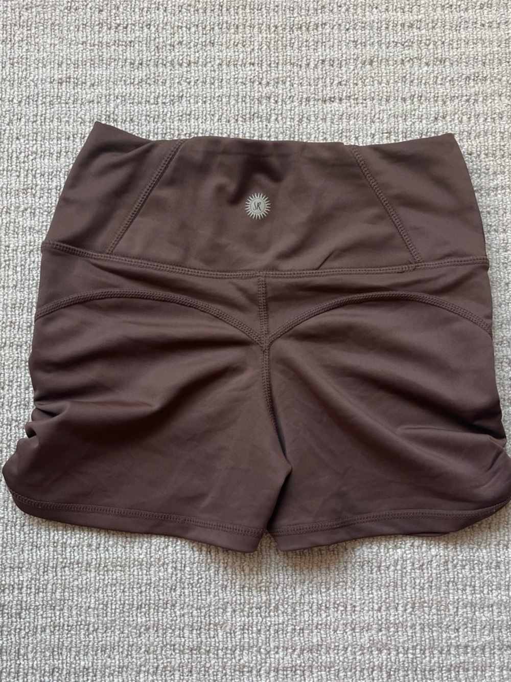 Sommer Ray brown high rise gym shorts